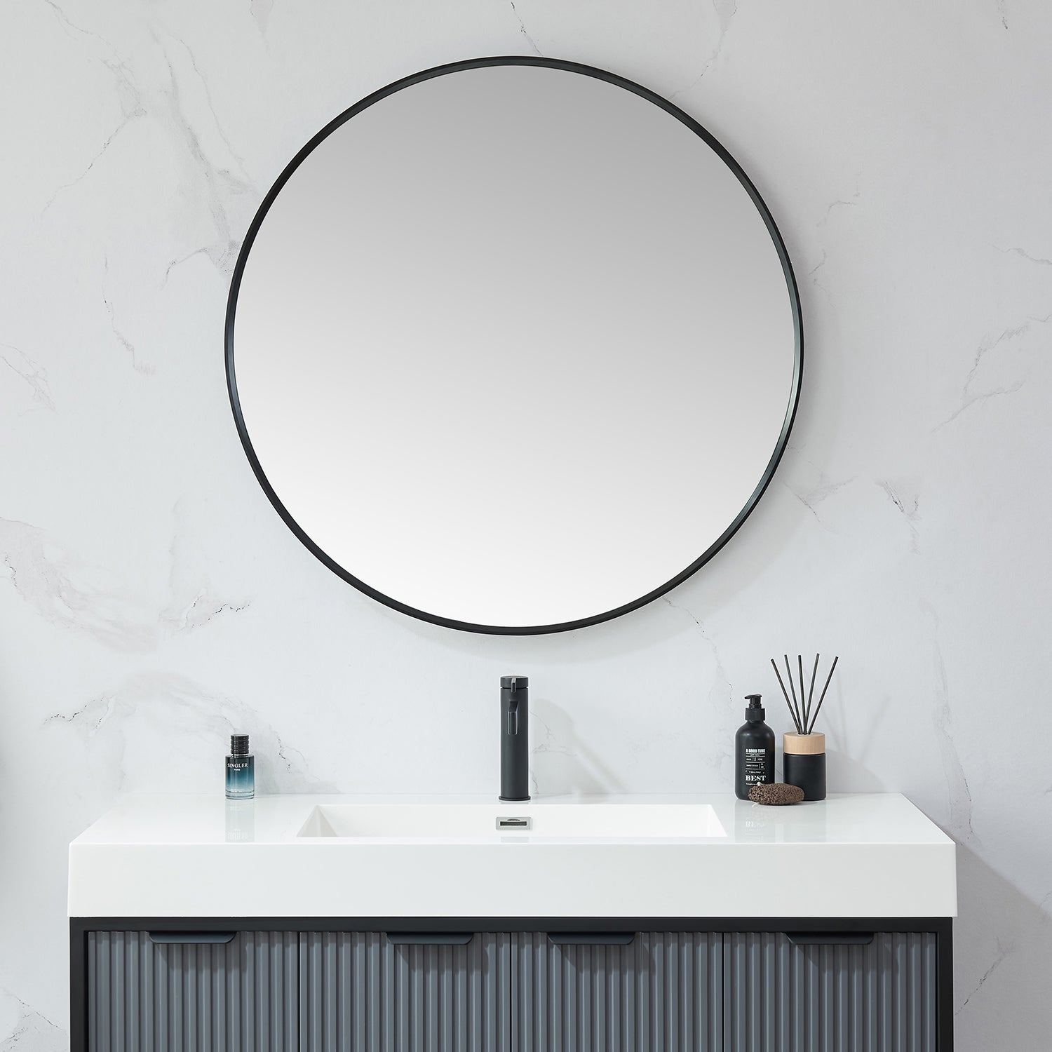 Cascante 35.4 in. W x 35.4 in. H Round Metal Wall Mirror in Brushed Black