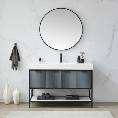 Cascante 35.4 in. W x 35.4 in. H Round Metal Wall Mirror in Brushed Black